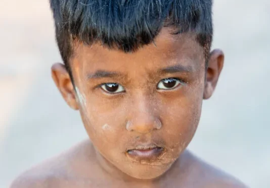 Bangladesh portrait little boy at brick factory